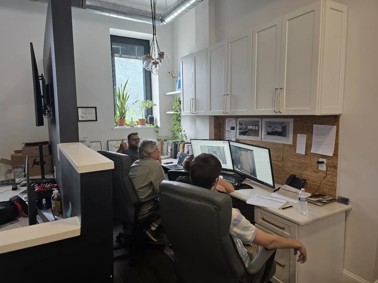 dRemodeling team reviewing a real project design
