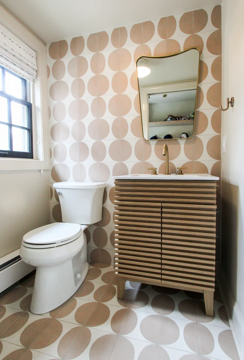 Philadelphia bathroom remodel with a wood vanity, patterned backsplash and modern mirror